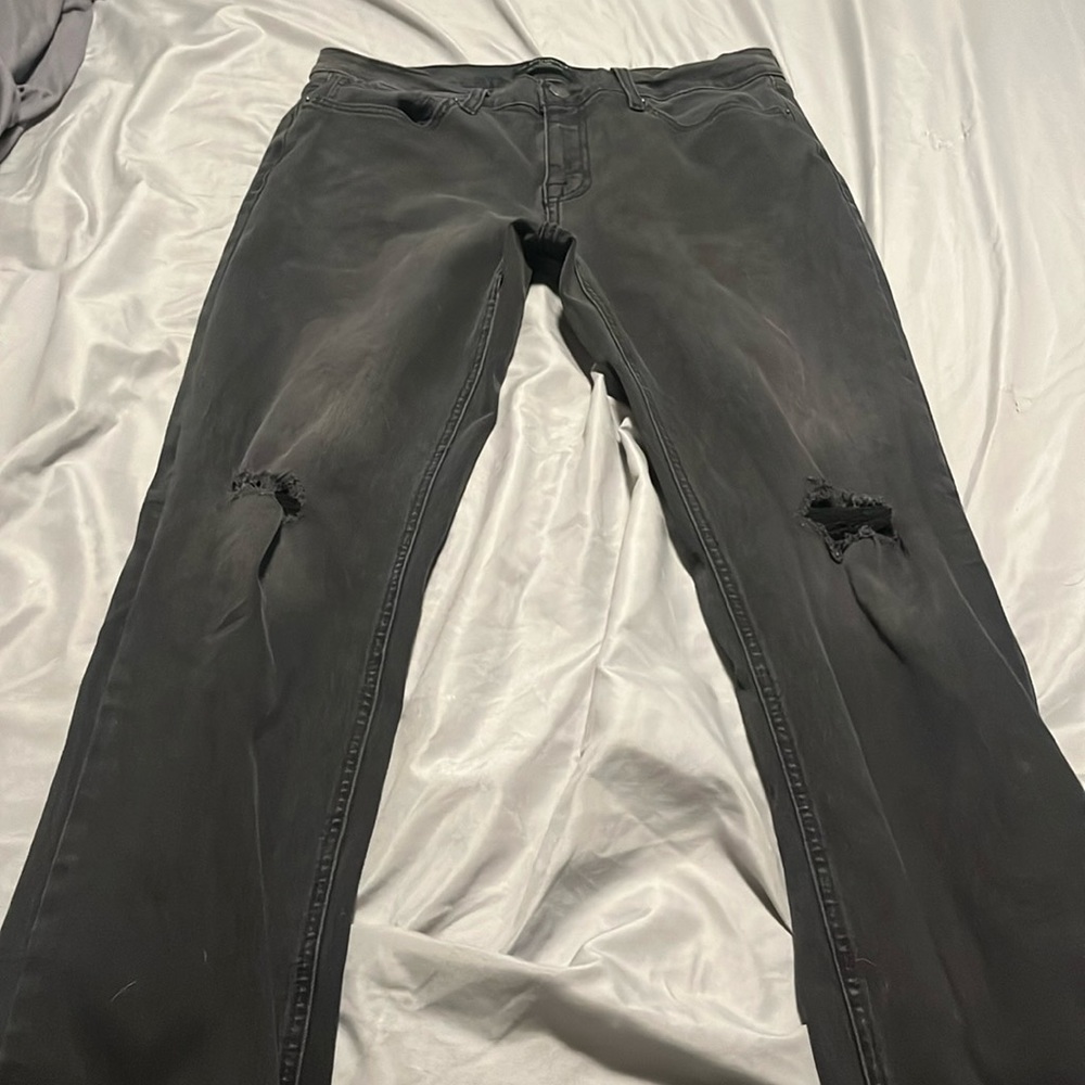 “No Boundaries” Ripped black straight jeans